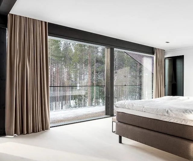 Modern bedroom with forest view
