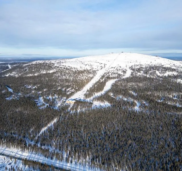 Snow-covered mountain landscape aerial