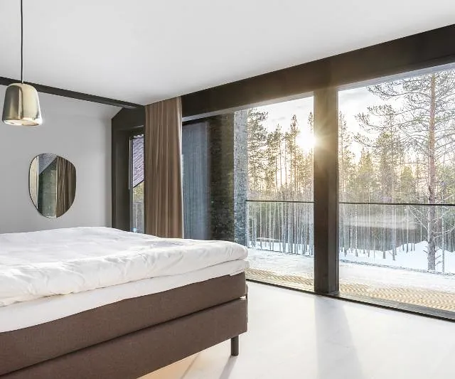 Modern bedroom with forest view