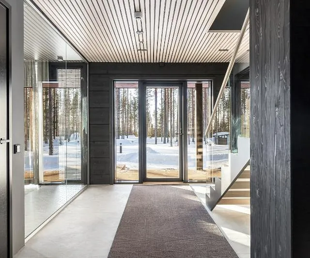 Modern entrance with snowy view