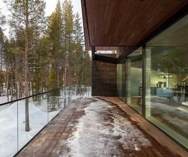 Modern cabin balcony in winter